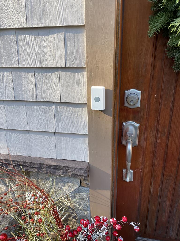 ERA-UTX Push Button Installed on Residential Home Wall